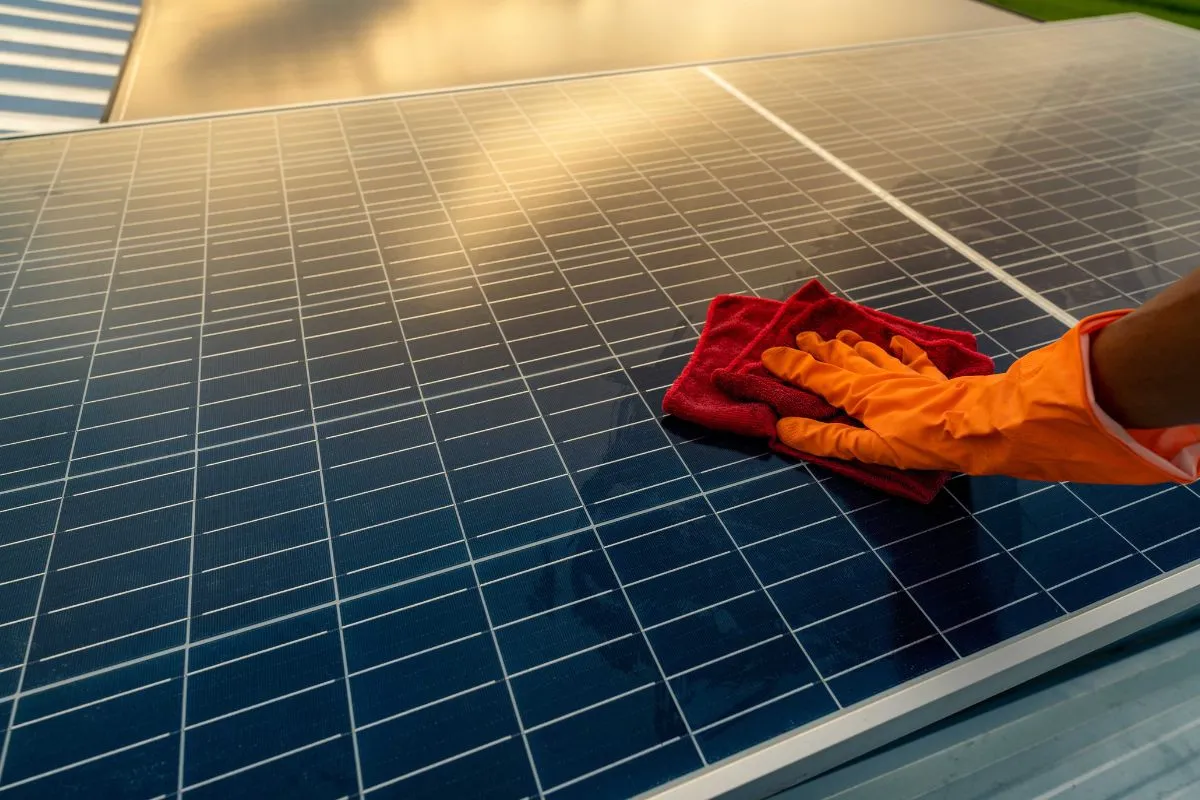 Solar Panels Getting Cleaned By Professional Roof Cleaning Experts